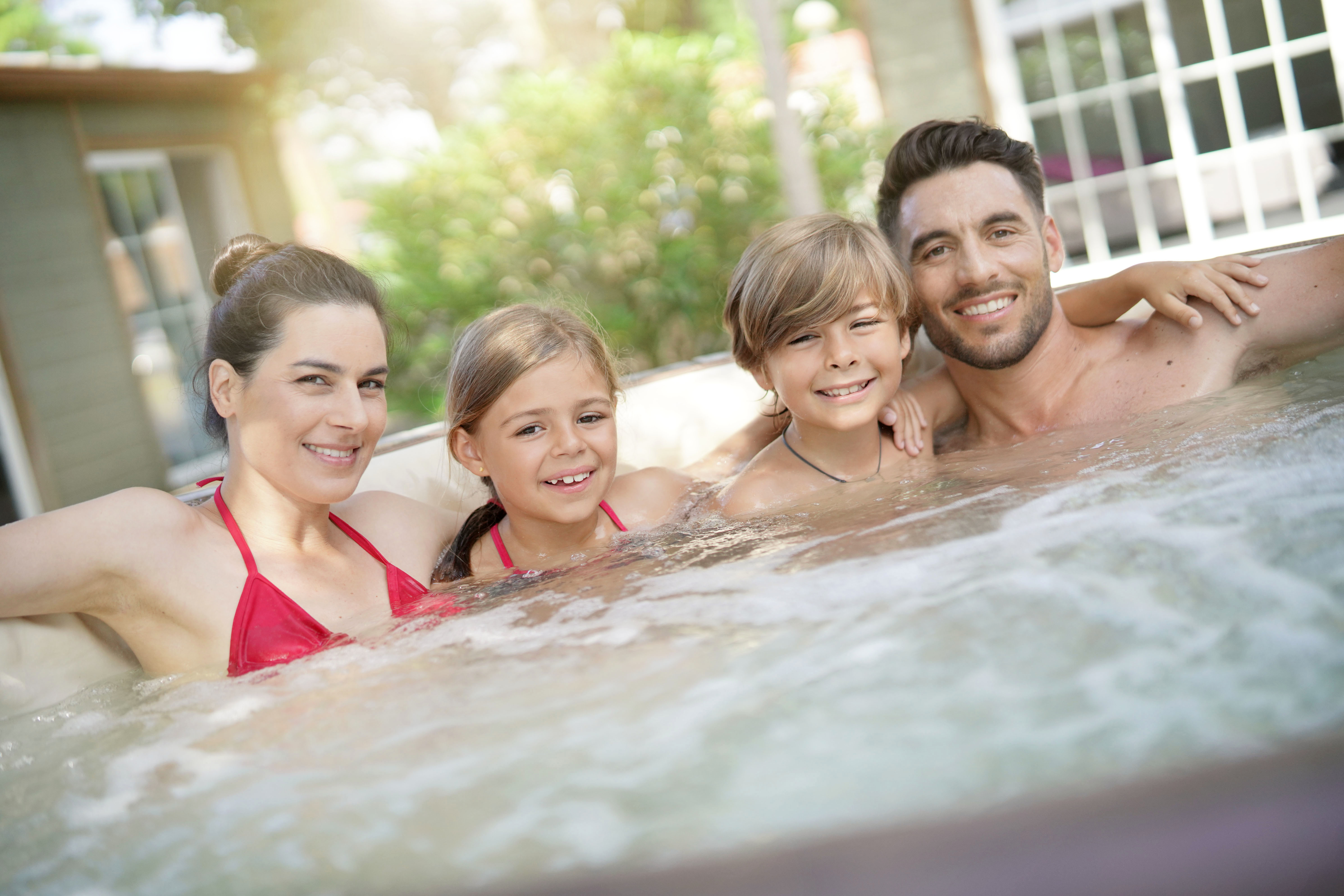 children with family on spa visit in jacuzzi